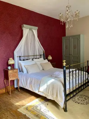 Un ou plusieurs lits dans un hébergement de l'établissement Chateau Gioux