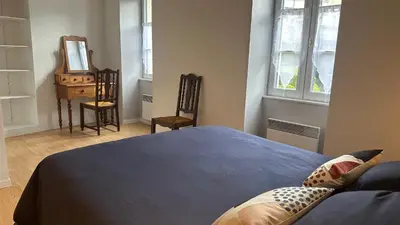Un ou plusieurs lits dans un hébergement de l'établissement Gîte au cœur de la ville ancienne