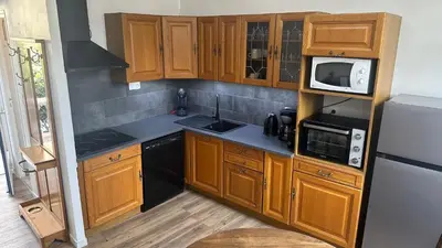Cuisine ou kitchenette dans l'établissement Gîte au cœur de la ville ancienne