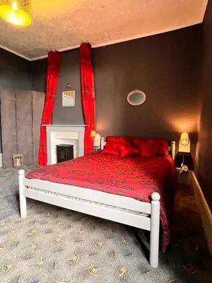 Un ou plusieurs lits dans un hébergement de l'établissement Chambre Anthracite