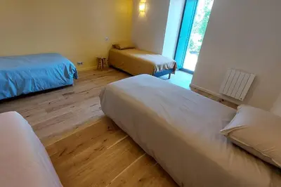 Un ou plusieurs lits dans un hébergement de l'établissement Gite 8 personnes Ussel Grande Maison rénovée