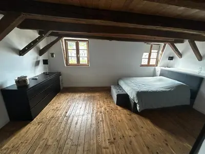 Un ou plusieurs lits dans un hébergement de l'établissement Petite maison de village