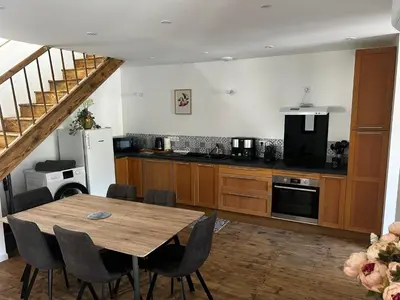 Cuisine ou kitchenette dans l'établissement Petite maison de village