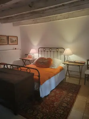 Un ou plusieurs lits dans un hébergement de l'établissement Chambre de charme