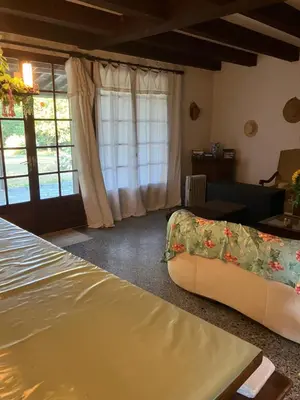 Coin salon dans l'établissement Gîte du Puy des Gardes