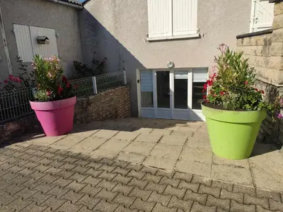Jardin de l'établissement Appartement cosy avec extérieur à Bretenoux
