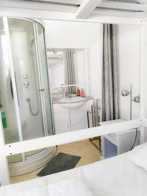 Un ou plusieurs lits dans un hébergement de l'établissement Le Beau Site appartement chaleureux et lumineux tout a pieds