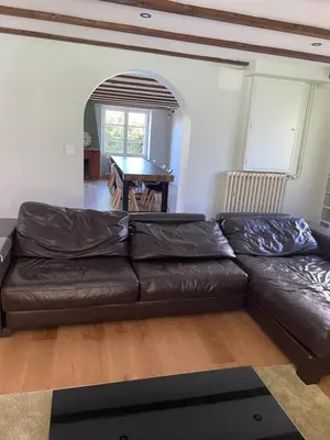 Coin salon dans l'établissement Grande maison familiale