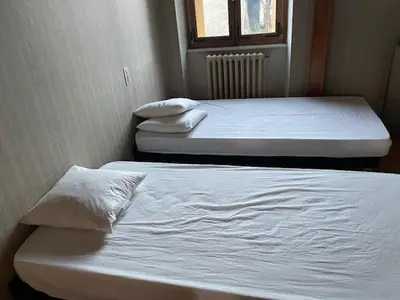 Un ou plusieurs lits dans un hébergement de l'établissement Grande maison familiale