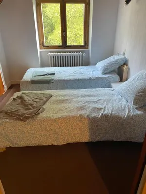 Un ou plusieurs lits dans un hébergement de l'établissement Grande maison familiale
