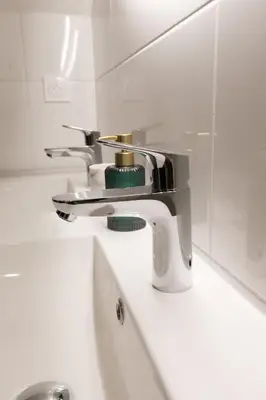 Salle de bains dans l'établissement Maison au calme, proche gare & centre-ville