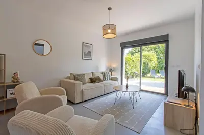 Coin salon dans l'établissement La maison du Stadium