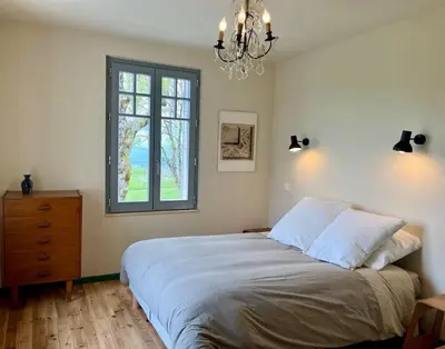 Un ou plusieurs lits dans un hébergement de l'établissement Maison 50 Belvédère du Cézallier