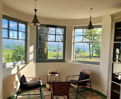 Coin salon dans l'établissement Maison 50 Belvédère du Cézallier