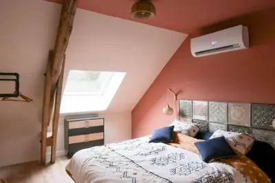 Un ou plusieurs lits dans un hébergement de l'établissement Grange La Rouge - gîte Corrèze