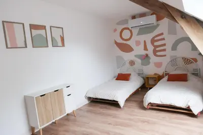 Un ou plusieurs lits dans un hébergement de l'établissement Grange La Rouge - gîte Corrèze