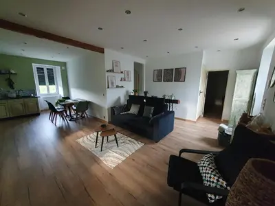 Coin salon dans l'établissement Maison dans ancien corps de ferme 4 à 6 personnes
