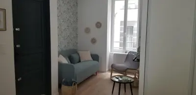 Coin salon dans l'établissement Résidence Les Sources centre-ville F3