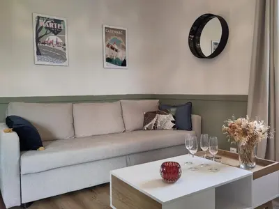 Coin salon dans l'établissement Appartement cosy avec Jardin clôturé
