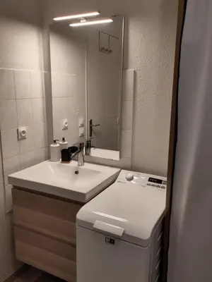 Salle de bains dans l'établissement Appartement cosy avec Jardin clôturé