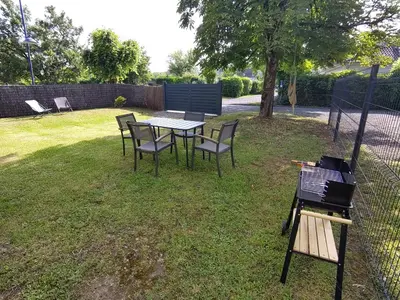 Jardin de l'établissement Appartement cosy avec Jardin clôturé