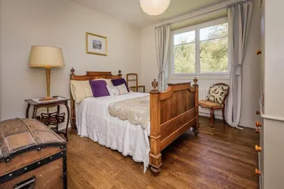 Un ou plusieurs lits dans un hébergement de l'établissement The Segur Cottage