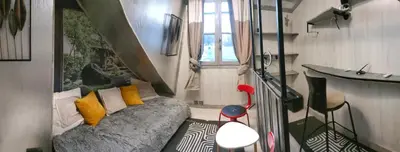 Coin salon dans l'établissement 3 ch, 5 pers 1 bébé, cuisine équipée, cosy
