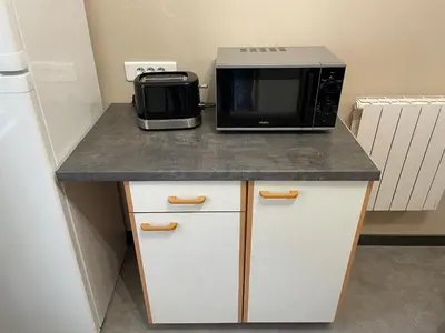 Cuisine ou kitchenette dans l'établissement Charmant appartement centre ville proche thermes