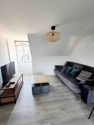 Coin salon dans l'établissement jolis logements brivistes 4
