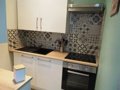 Cuisine ou kitchenette dans l'établissement Appartement Mont-dore centre 6-8 personnes 2 ch