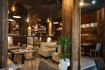 Coin salon dans l'établissement Le Genève