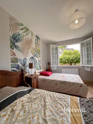 Un ou plusieurs lits dans un hébergement de l'établissement Family Home and Nature in Eymoutiers