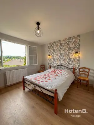 Un ou plusieurs lits dans un hébergement de l'établissement Family Home and Nature in Eymoutiers