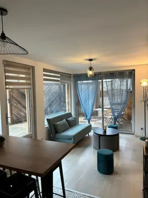 Coin salon dans l'établissement Jolis logements brivistes 6