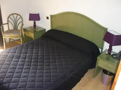 Un ou plusieurs lits dans un hébergement de l'établissement Auberge de l'Aspre