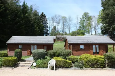 Jardin de l'établissement Volcans Vacances Les Chalets Du Lac
