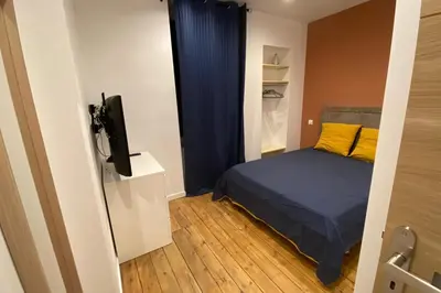 Un ou plusieurs lits dans un hébergement de l'établissement 19B - Le Bastille a cosy apartment in a great location
