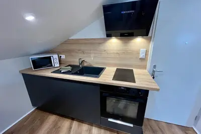 Cuisine ou kitchenette dans l'établissement Casa Lou Marine - T1 - Hyper Centre