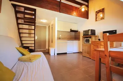 Cuisine ou kitchenette dans l'établissement Studio duplex au pied des pistes