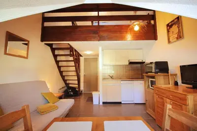 Cuisine ou kitchenette dans l'établissement Studio duplex au pied des pistes