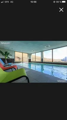 Piscine de l'établissement Grand appartement piscine ou située à proximité