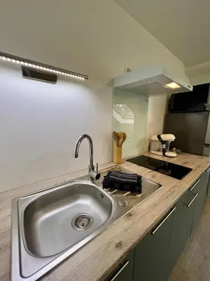 Cuisine ou kitchenette dans l'établissement Casa Viasud #2 - 28m2 et Casa Viasud #3 - 48m2 - T2 climatisés - Centre BriveGare