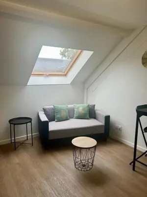 Coin salon dans l'établissement Casa Viasud #2 - 28m2 et Casa Viasud #3 - 48m2 - T2 climatisés - Centre BriveGare