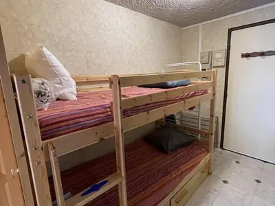 Un ou plusieurs lits dans un hébergement de l'établissement Duplex moderne avec balcon, proche pistes, 2 chambres - FR-1-787-77