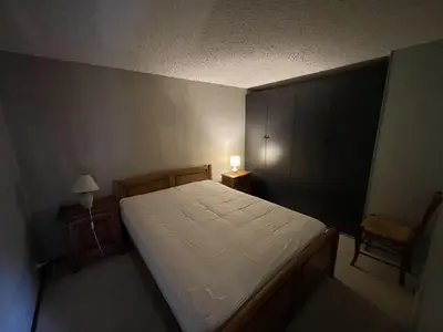 Un ou plusieurs lits dans un hébergement de l'établissement Duplex moderne avec balcon, proche pistes, 2 chambres - FR-1-787-77