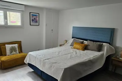 Un ou plusieurs lits dans un hébergement de l'établissement Appartement cosy neuf