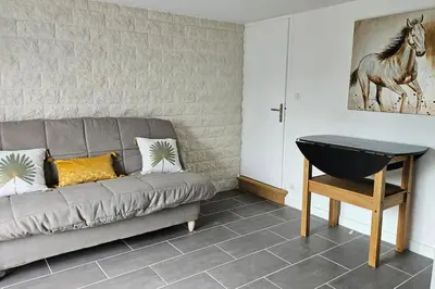 Coin salon dans l'établissement Appartement cosy neuf