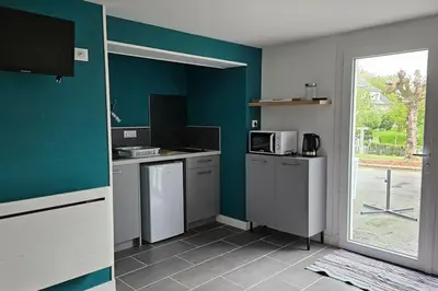 Cuisine ou kitchenette dans l'établissement Appartement cosy neuf