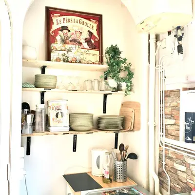 Cuisine ou kitchenette dans l'établissement Hyper centre dans ancien palace face aux thermes