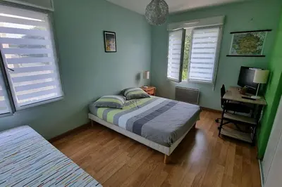 Un ou plusieurs lits dans un hébergement de l'établissement Villa bleue